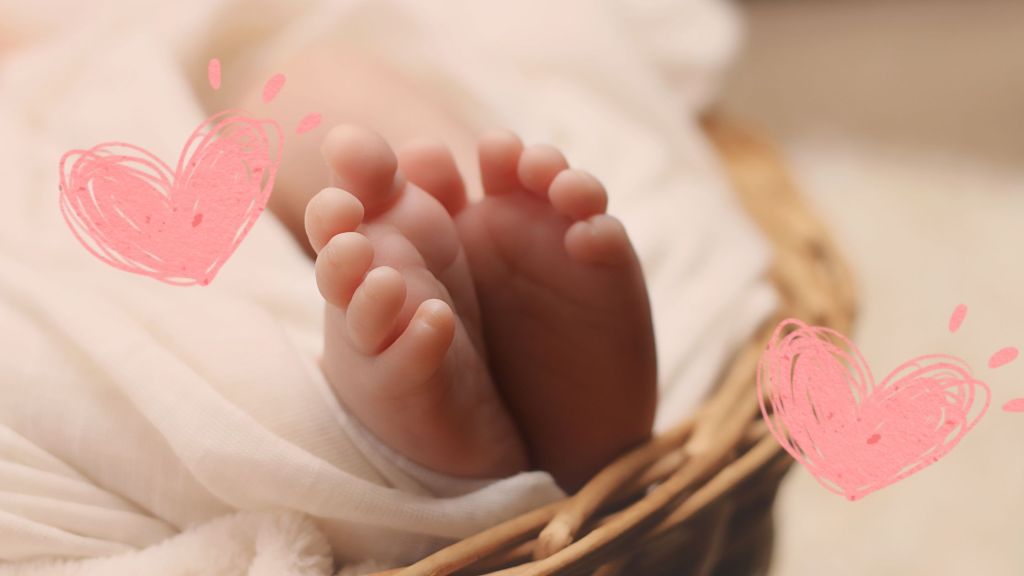 baby daughter, tiny baby feet with hearts